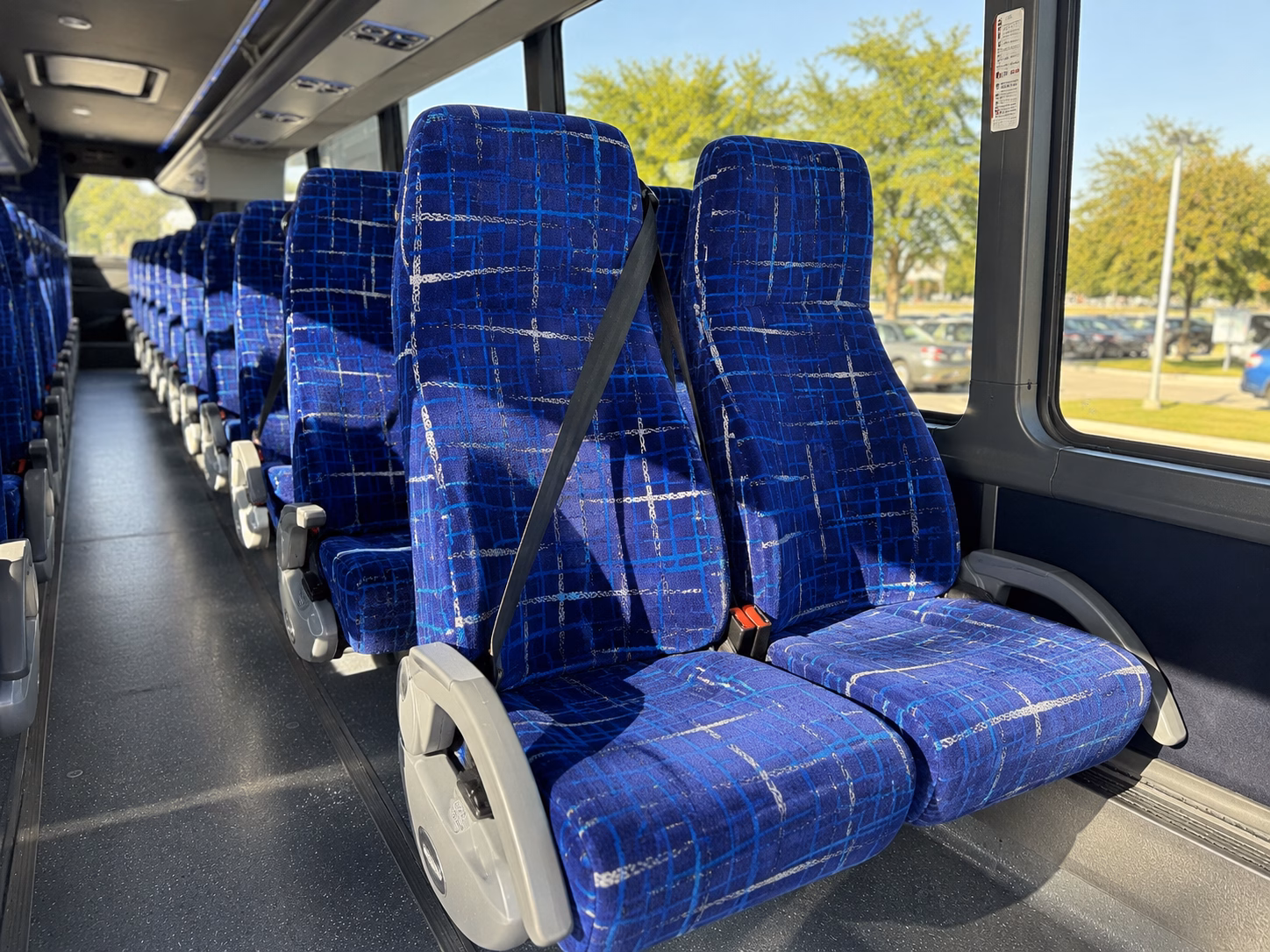how starting location and deadhead miles affect charter bus rates in ypsilanti
